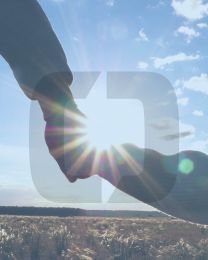 father holding hands with daughter outdoors with the cordell & cordell icon overlayed