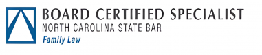 Logo for the North Carolina State Bar Board Certified Specialist in Family Law, featuring a blue square with a stylized triangle mark and the words 'Board Certified Specialist' and 'Family Law' in blue script.