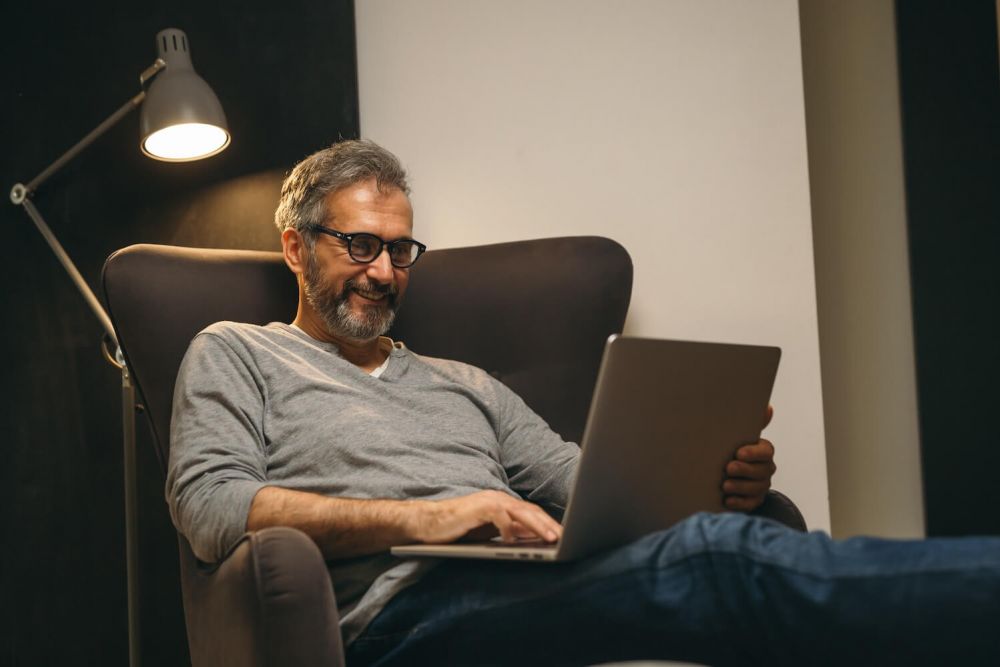 retired man on computer