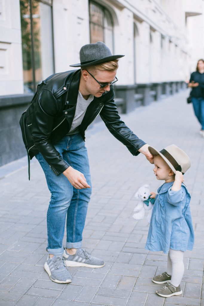 Man and Child With Hats
